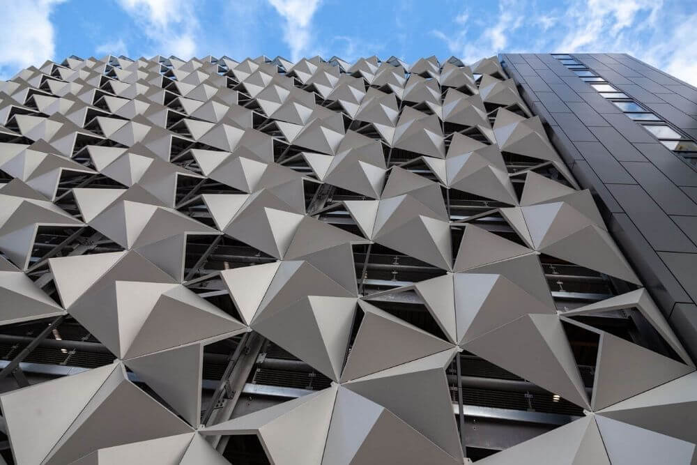 Dramatic Architectural Façade Transforms Salford Car Park Maple